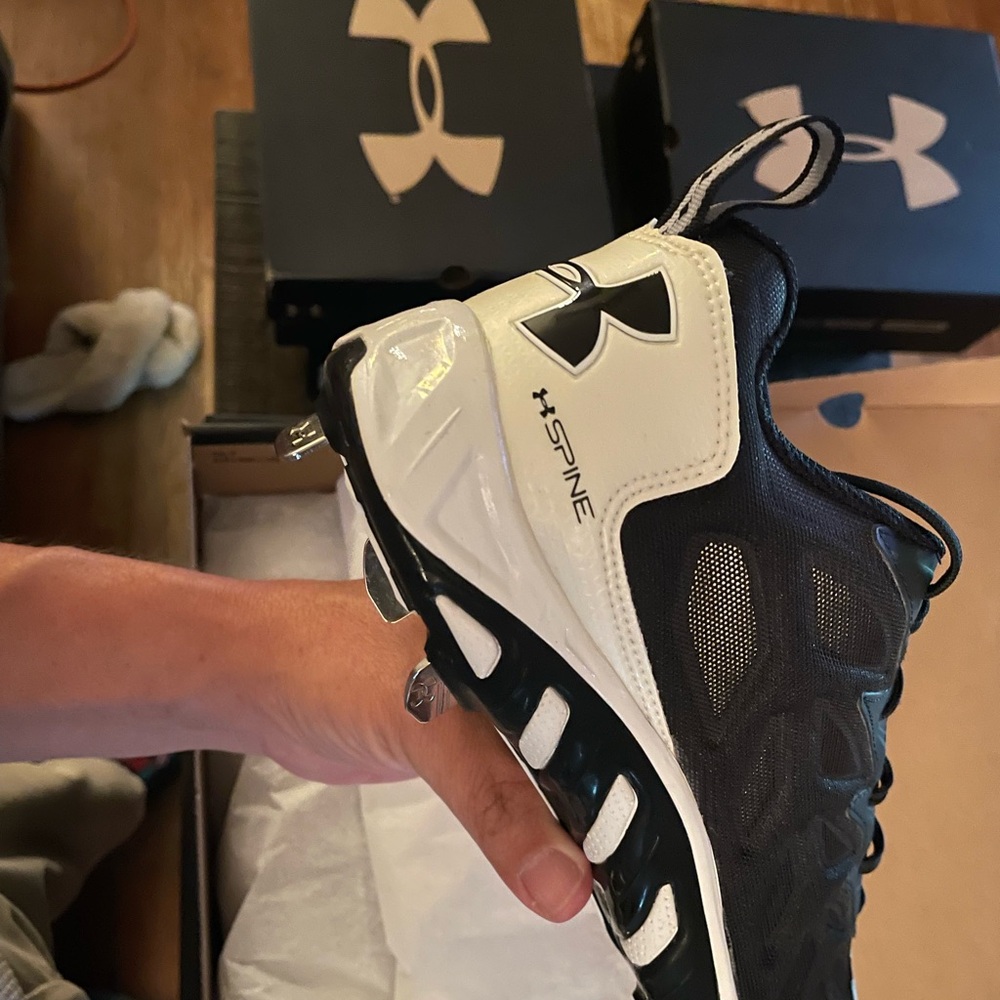 Under Armour Black and white metal spine baseball cleats brand new